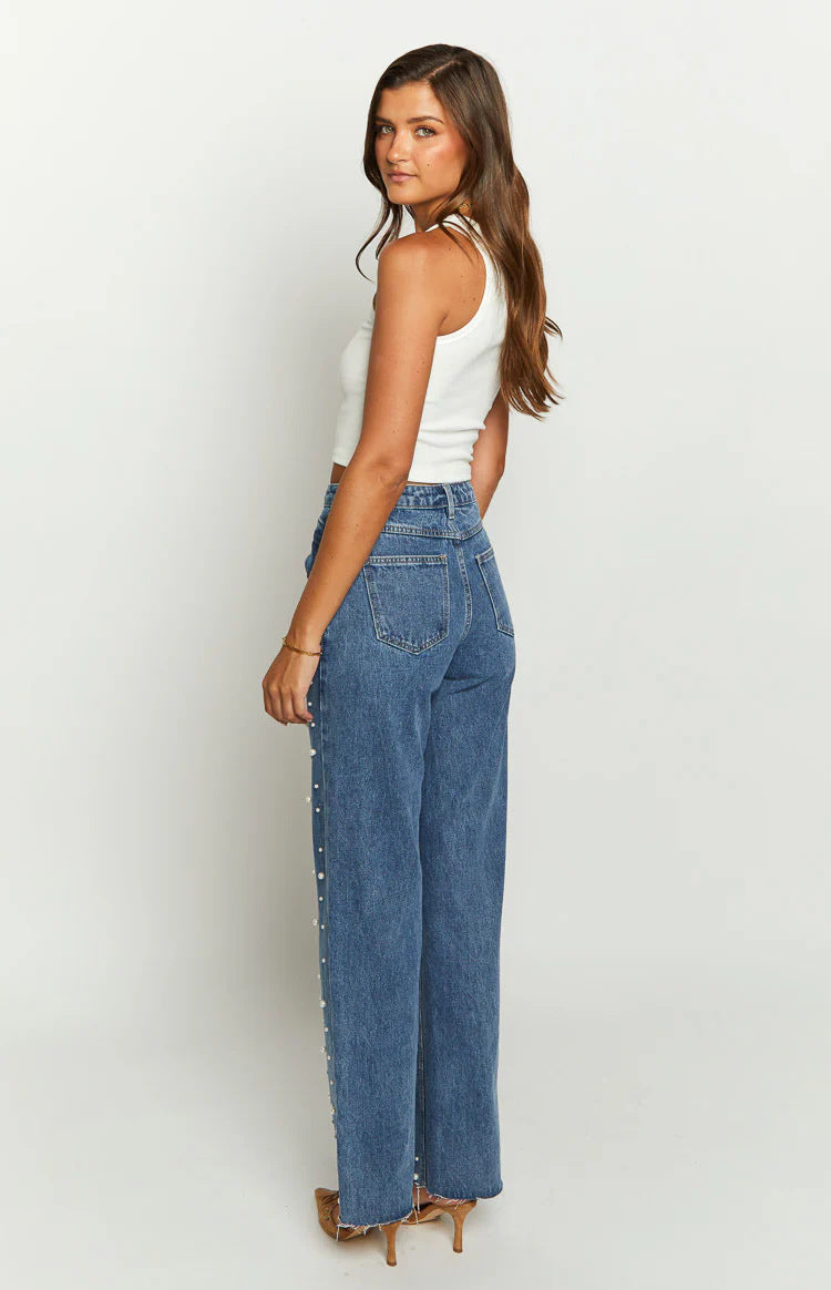 Jean droit à taille asymétrique, perles et ourlet effiloché