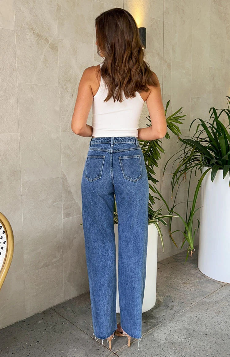 Jean droit à taille asymétrique, perles et ourlet effiloché
